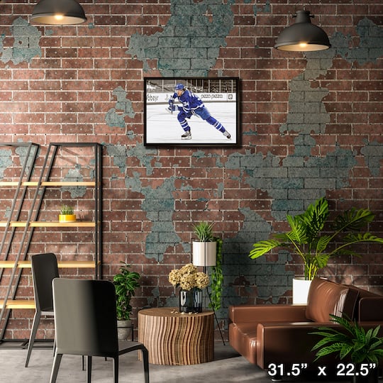 Auston Matthews Toronto Maple Leafs Framed 20" x 29" Hustling Spotlight Canvas 31.5" x 22.5"